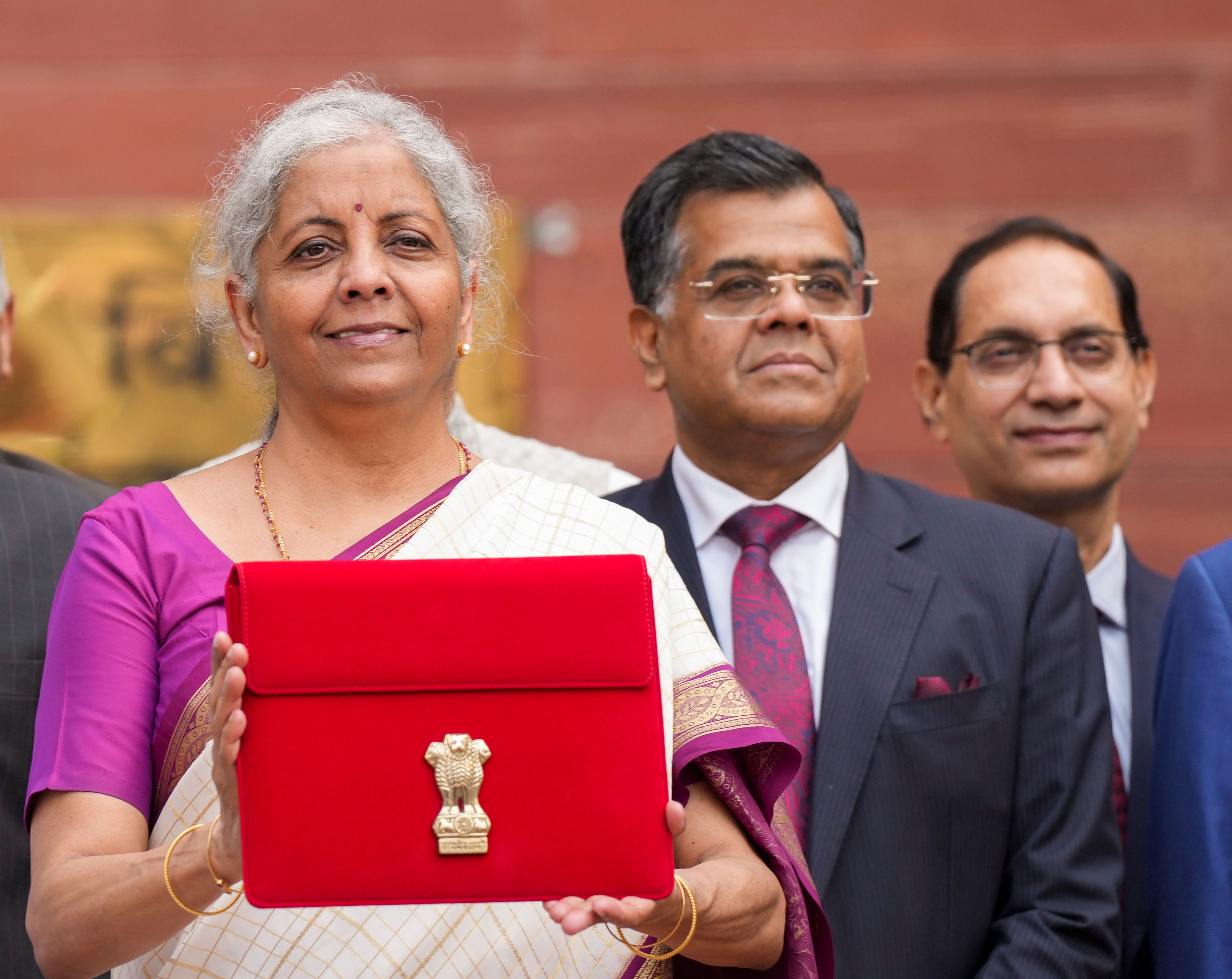 Nirmala Sitharaman Again Takes Tablet In Red Pouch To Present Paperless ...