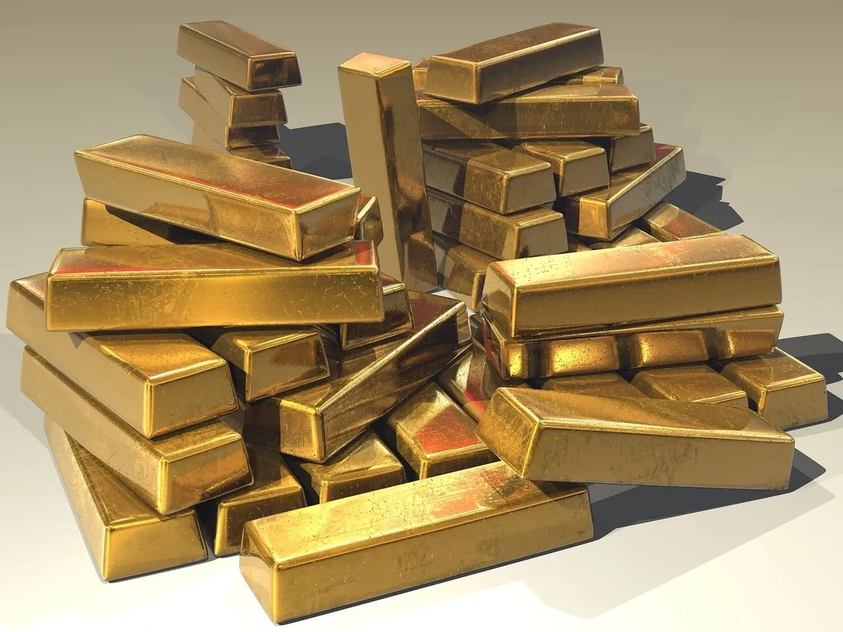Gold was trading 1.77% lower at USD 2,420.40 per ounce in New York