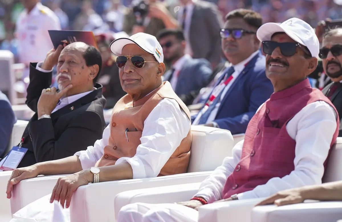 Union Defence Minister Rajnath Singh with MoS Sanjay Seth and Nagaland CM Neiphiu Rio watches the fly-past during the inauguration of the 15th edition of Aero India 2025 at Yelahanka Airbase in Bengaluru (PTI Photo)