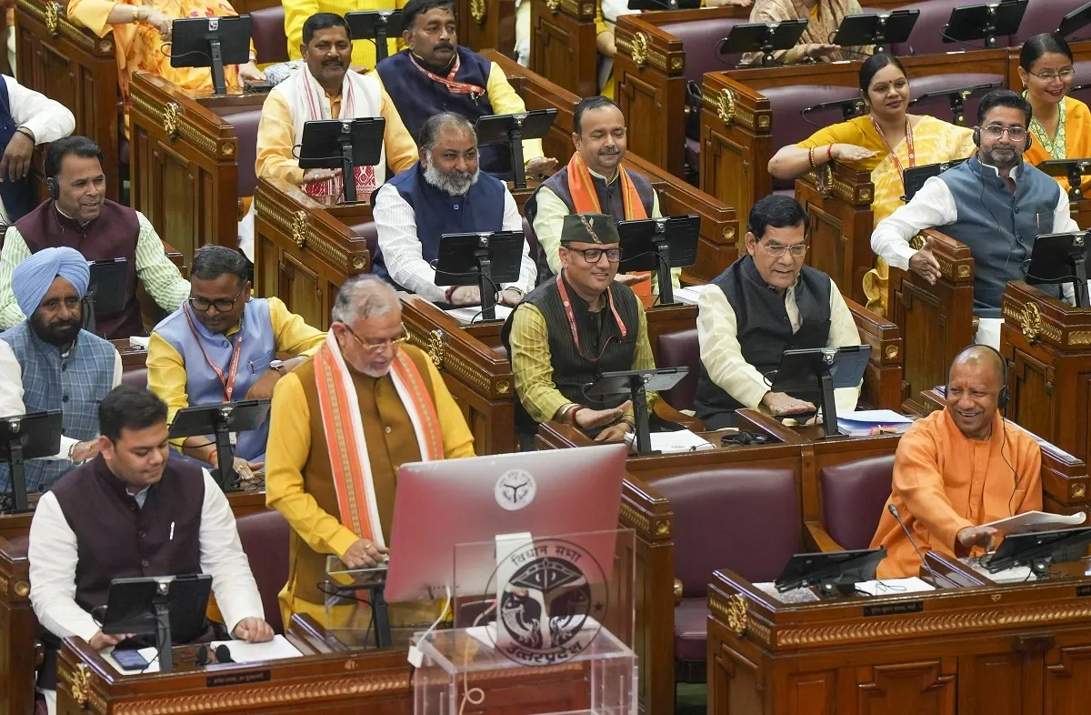 Uttar Pradesh Chief Minister Yogi Adityanath looks on as Finance Minister Suresh Kumar Khanna presents the State Budget 2025-26 in the Assembly, in Lucknow (PTI Photo)